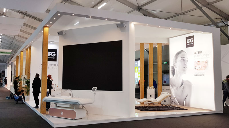 Medical congress exhibition stand at MEDICA Düsseldorf with clean modern design and professional equipment display